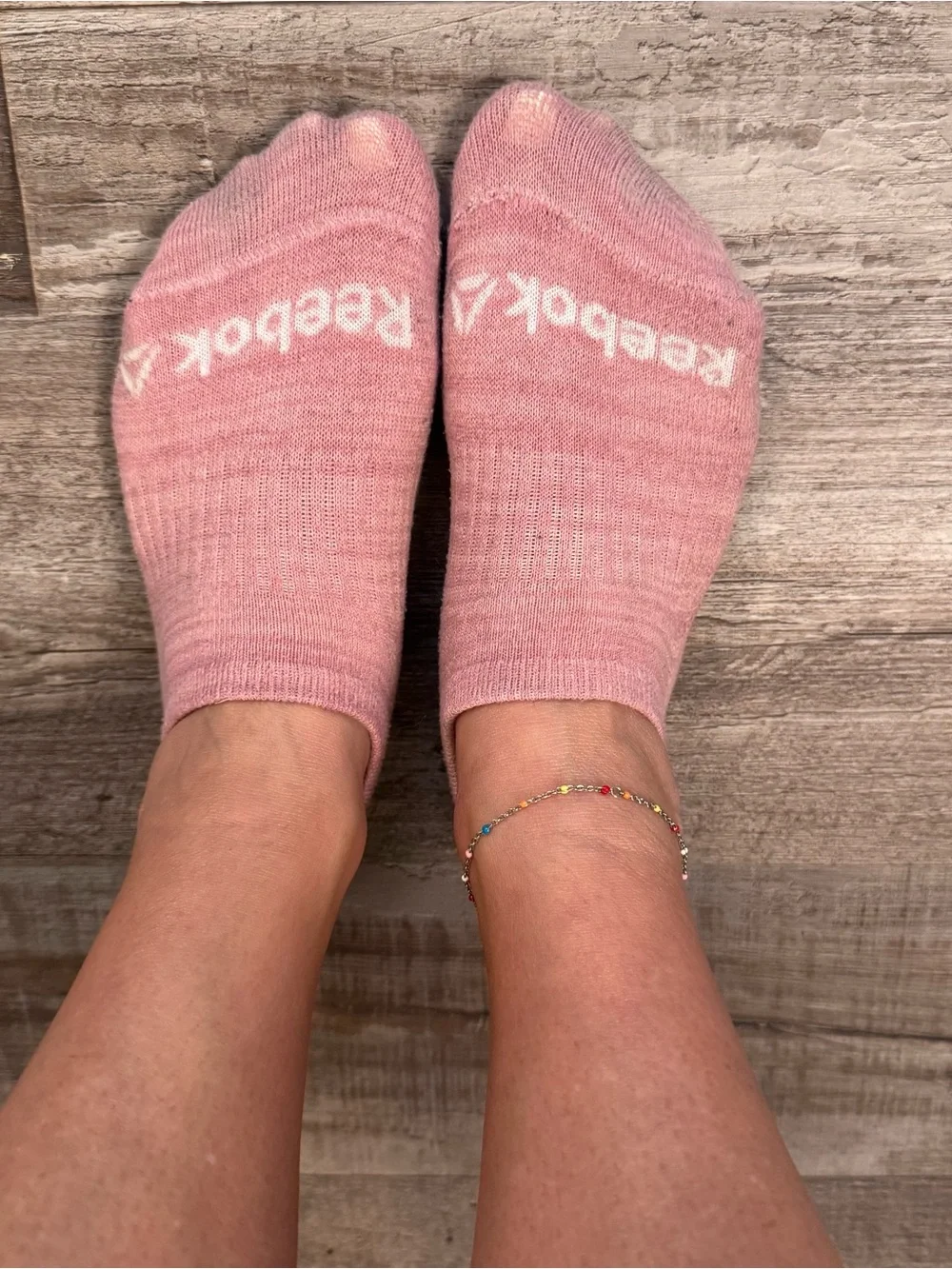 Well worn Reebok Pink No-Show Athletic Socks